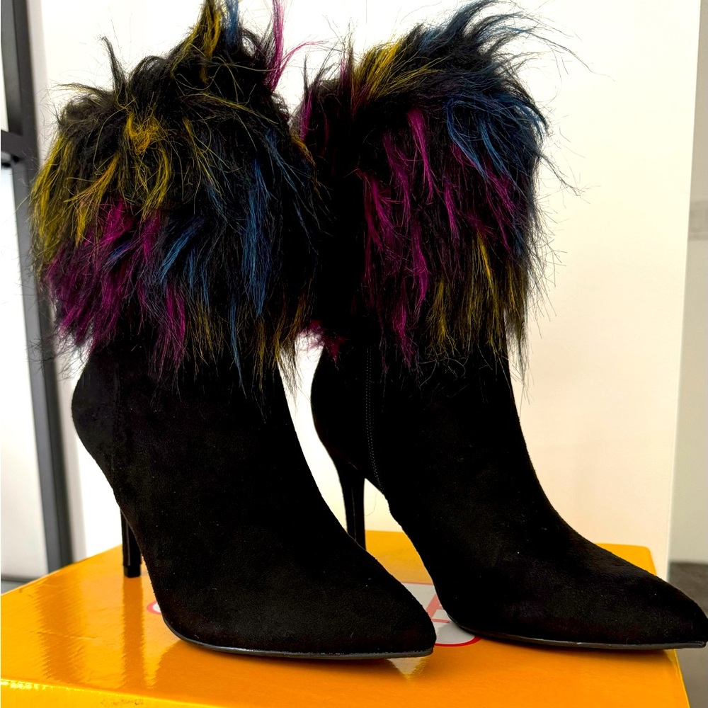 Brand new women’s heeled boots.